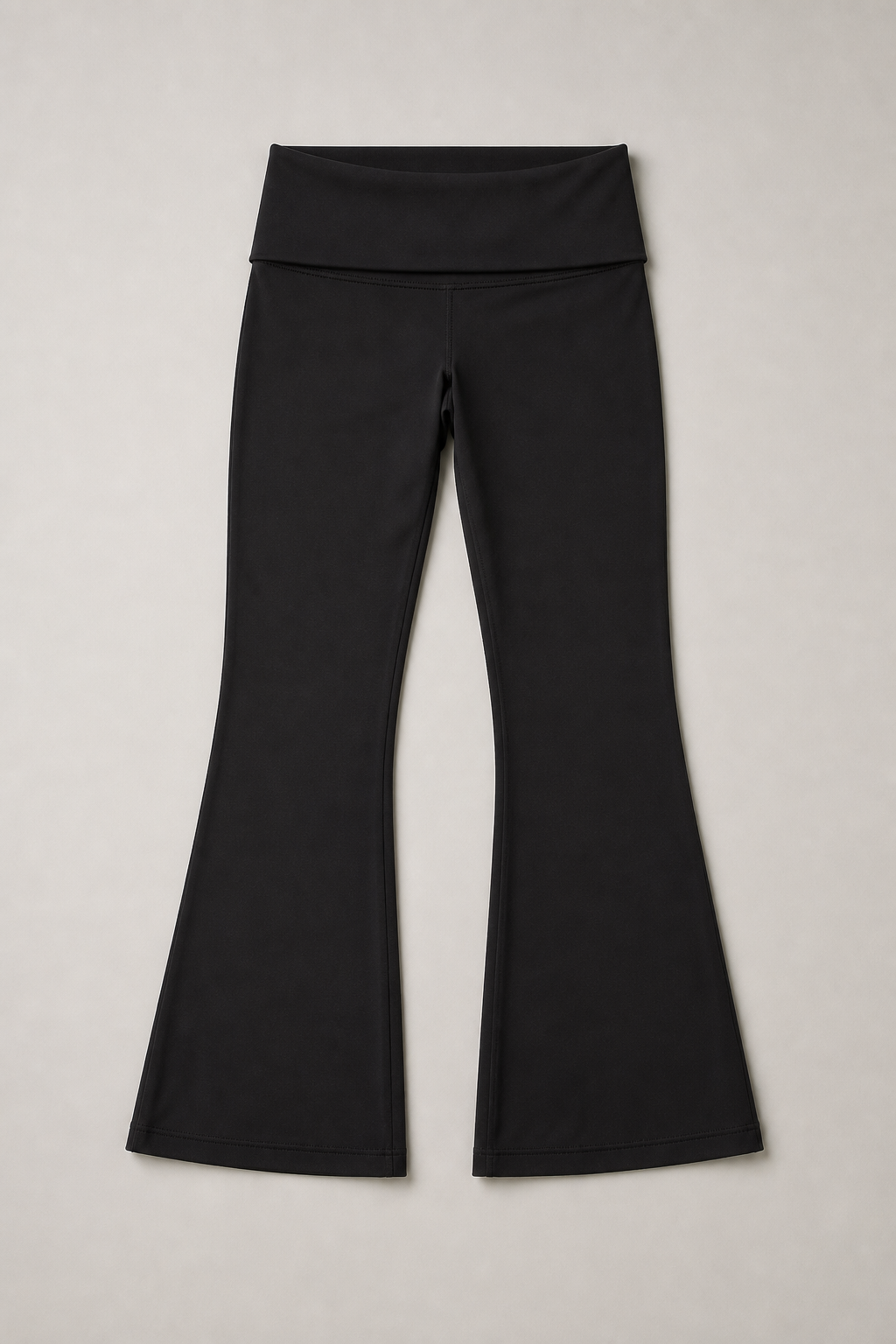 Black foldover flare Pilates pants product flat lay