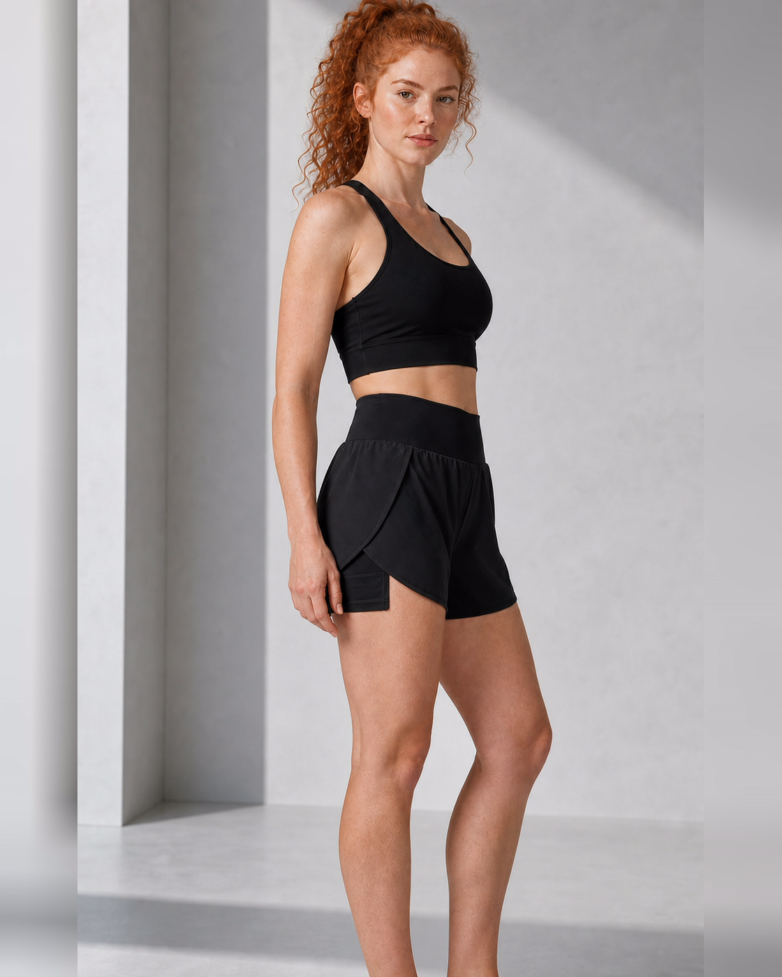 Side view showing the fitted liner and outer-thigh pocket beneath the black shell.