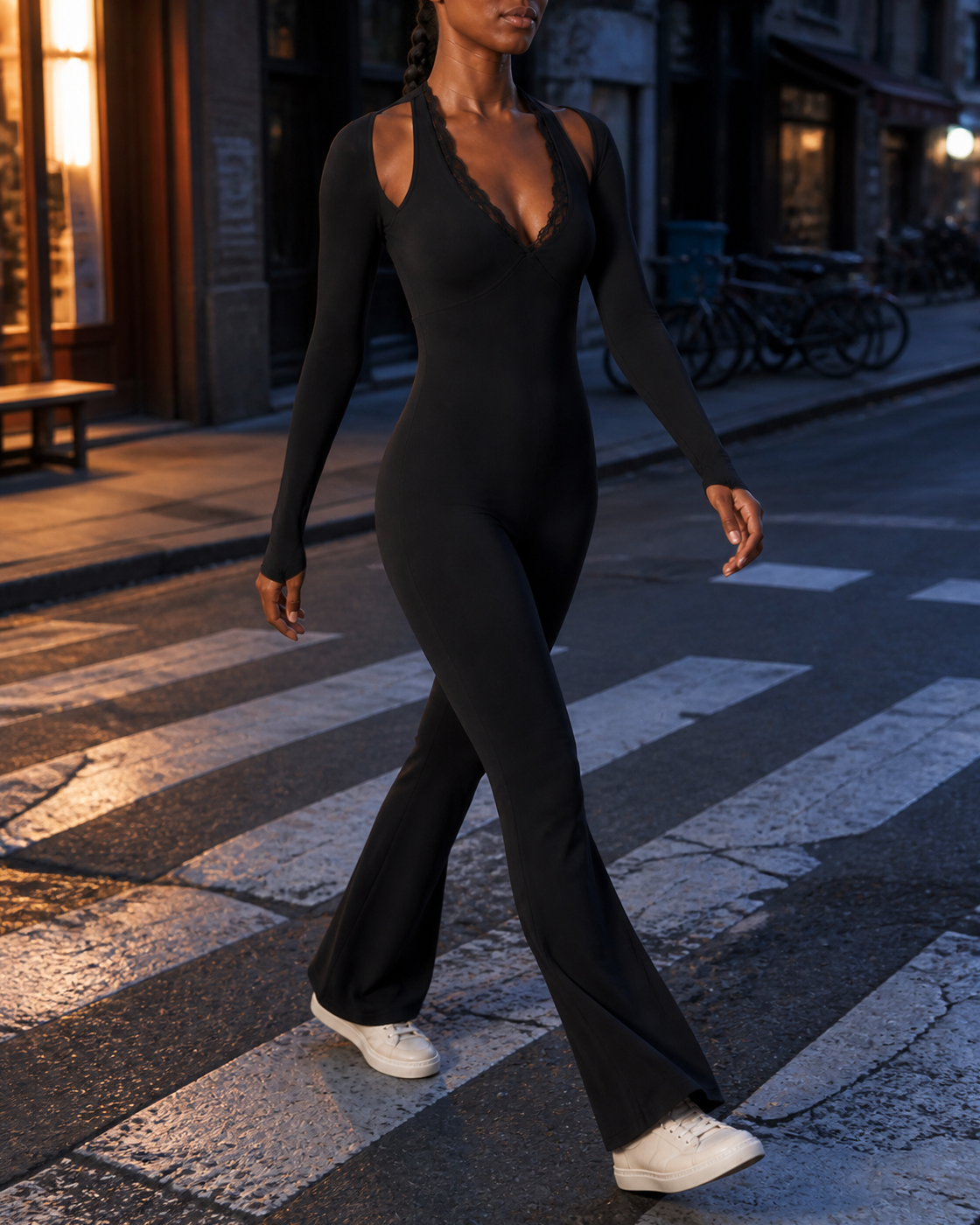Black lace-trim one-piece styled at an evening city crossing.